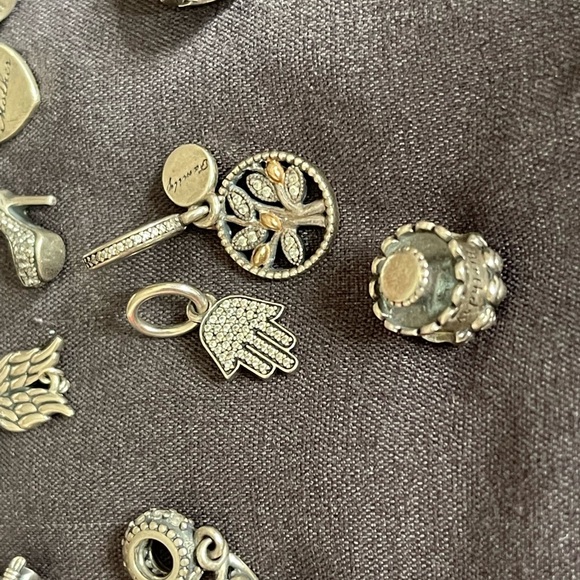 Lot of 26 Authentic Pandora charms.